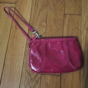 Hot pink Coach wristlet